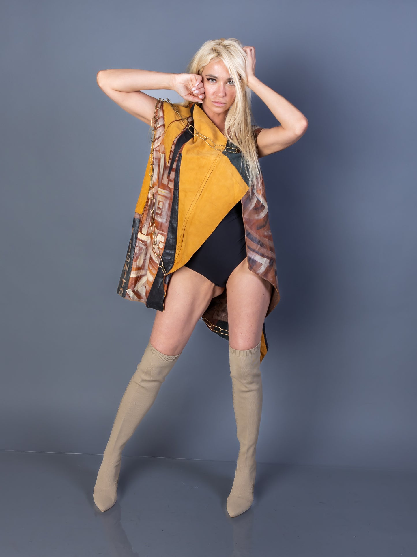 “Tribe:X” – Asymmetric Leather Vest with Afro-Futurist Face Art & Chain Mask